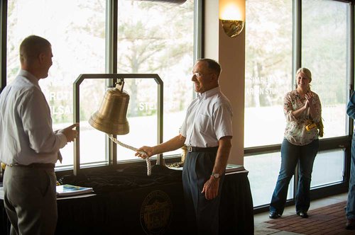 Charles Wilhite rings the ESU Foundation’s replica bell.